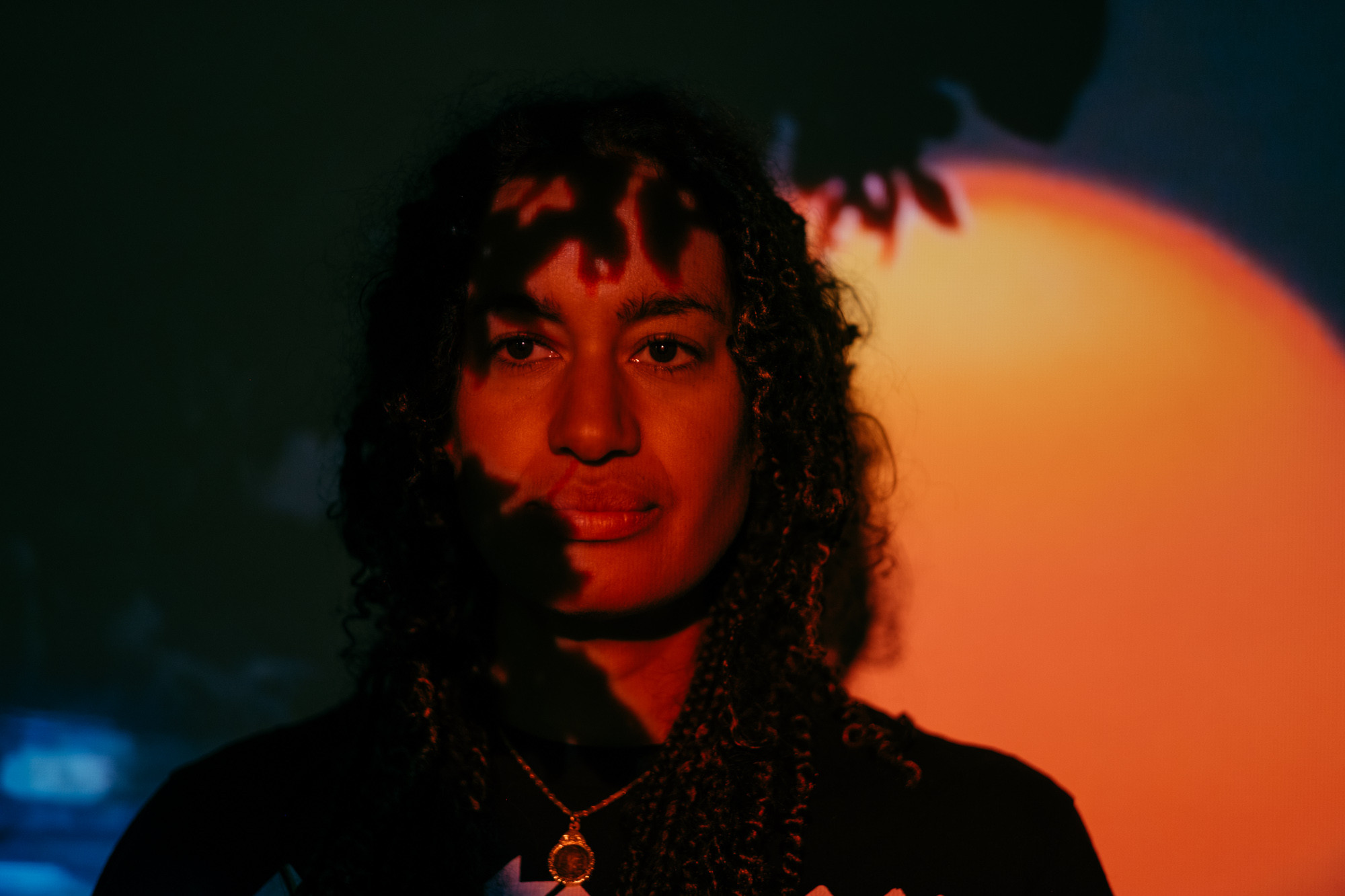 Linda Lamignan in front of the screening of DIRIMOR (2024). Photo by Tiny Productions for Coast Contemporary.