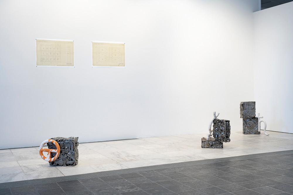 Gaea Norvegica. Marte Johnslien, 2023. Installation of found objects, architectural drawings of alchemy floors, and ceramic sculptures glazed with minerals and sulphate collected on field trips to the titanium dioxide industries in Norway. KRAFT, Bergen. Photo: Thor Brødreskift.